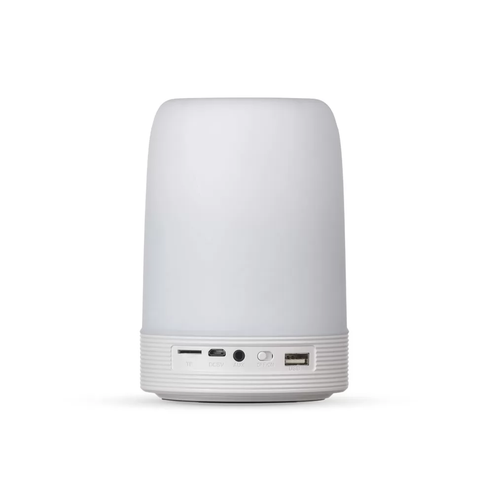 Caixa de som multimídia com luminária na cor branca, exibindo painel com entradas USB e botões na base plástica
