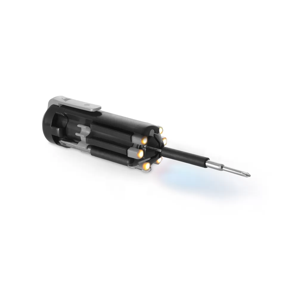 Kit de Ferramentas Gabro multifuncional preto com ponta estendida e luzes de LED acesas em fundo branco